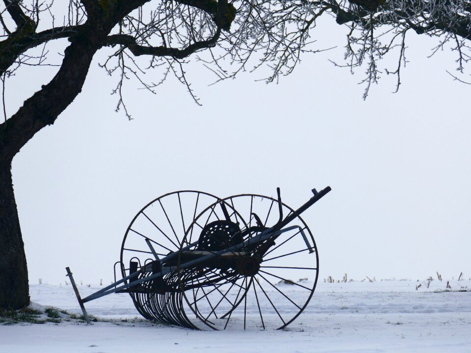 Snow still life hay tedders