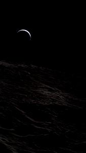 A crescent Earth seen from Lunar orbit by Apollo 15 Astronaut Al Worden photo