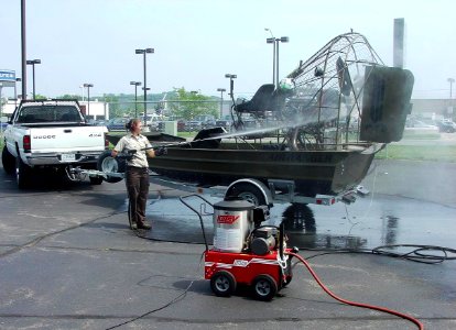 Field equipment is disinfected with a pressurized steam cleaner at the La Crosse FWCO (WI) to help prevent the tranmission of aquatic nuisance species. photo