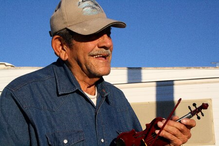 Old man violin musician