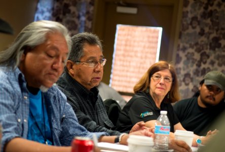 Native Americans representing 11 different tribes receiving training from Forest Service staff