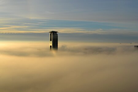 Skyscraper architecture above the clouds
