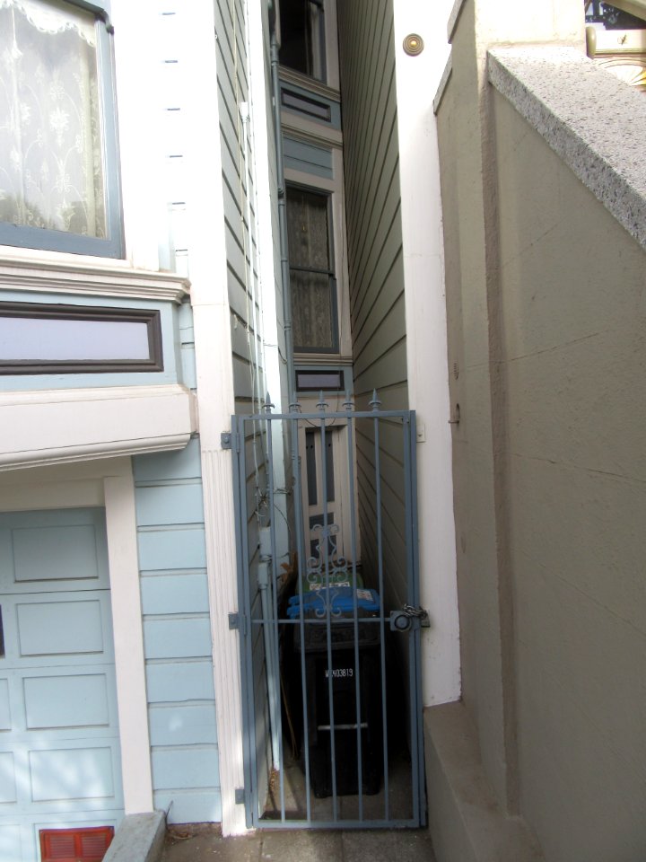 Garbage Can in Alcove Between Two Alamo Square Painted Ladies