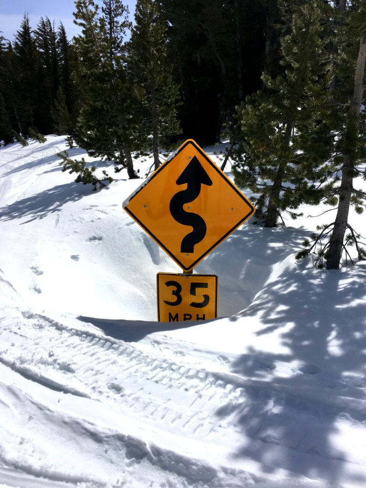 Snowed in road sign