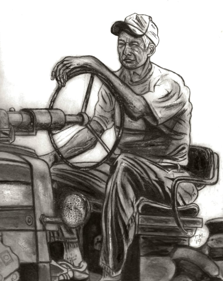 Mr. Sailor Driving an Antique John Deere Tractor
