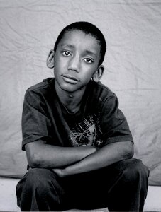 Kid sad poverty photo