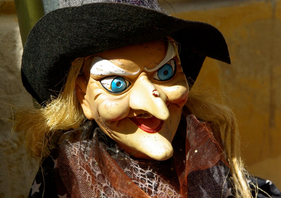 Witch blue eyes pointy nose