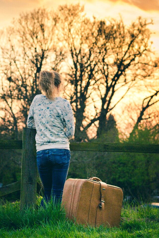 Woman suitcase waiting