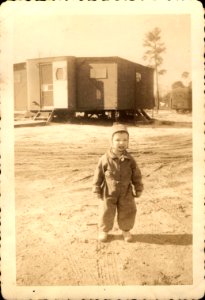 Young Child in Long Sleeved Outfit photo