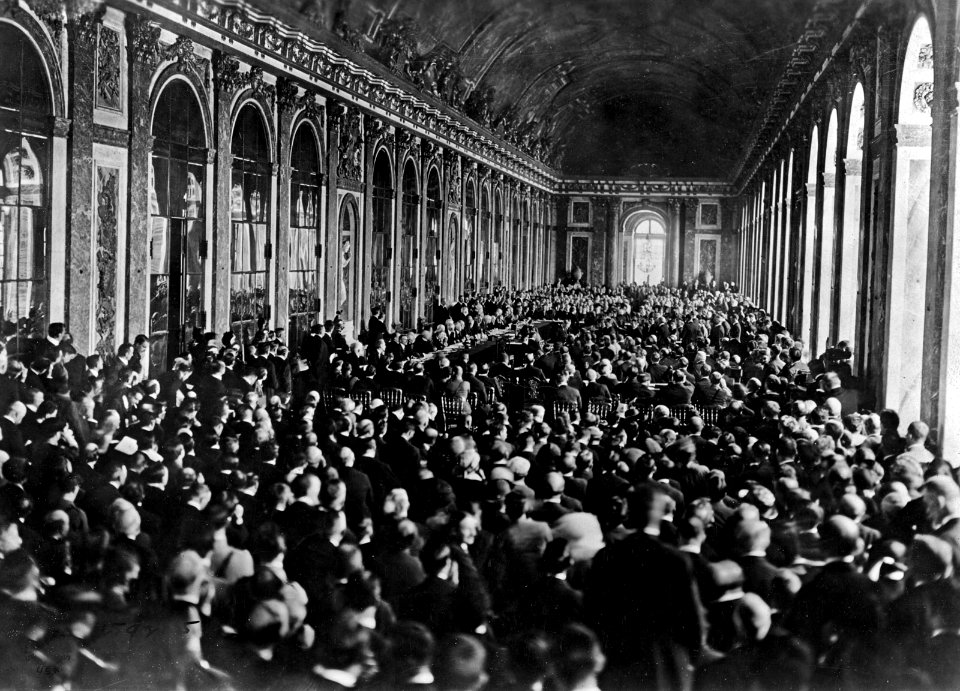 The signing of the Treaty of Versailles on June 28, 1919 in the Hall of Mirrors of the Palace of Versailles