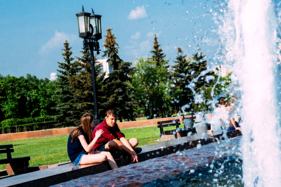 Stories at the fountain photo