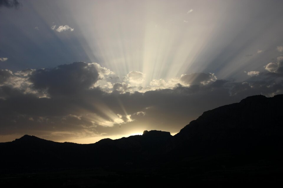 Sunlight streams mountain