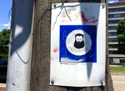 Bearded Man on a Pole photo