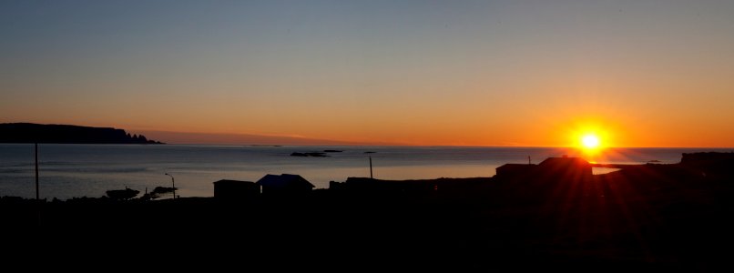 The summer solstice as seen from Munaðarnes, North of Djúpavík photo