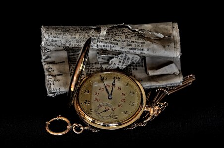 Daily newspaper rolled crumpled