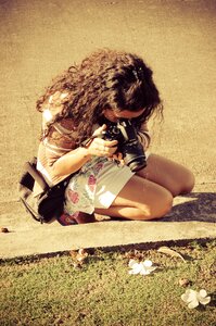 Curly hair girl flower photo