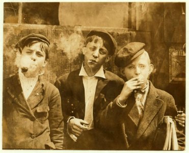 No Known Restrictions: Newsies at Skeeter's Branch, Jefferson near Franklin, St. Louis, Mo. by Lewis Hine, 1910 (LOC) photo