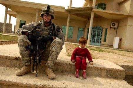 Public Domain: Soldier & Child in Iraq, March 2007 by Andy Dunaway, U.S. Air Force(DOD 070308-F-2828D-389) photo