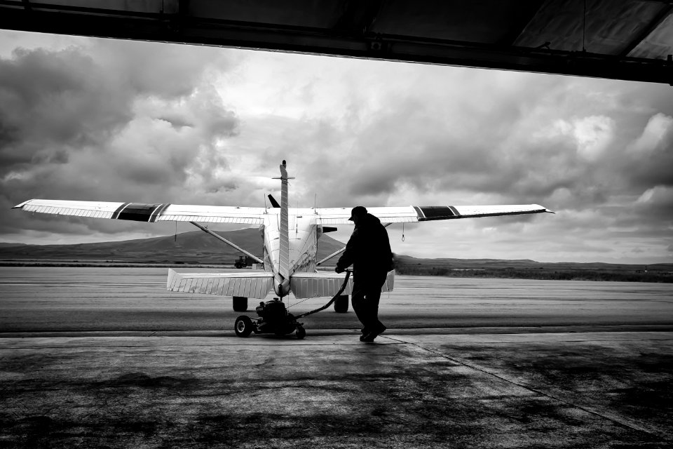 Pushing the refuge plane out of the hangar