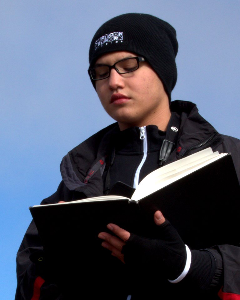 Diego (Pasadena Young Birder Club) working on his field notebook after viewing condor release. Photo by Susan Gilliland.