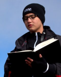 Diego (Pasadena Young Birder Club) working on his field notebook after viewing condor release. Photo by Susan Gilliland. photo