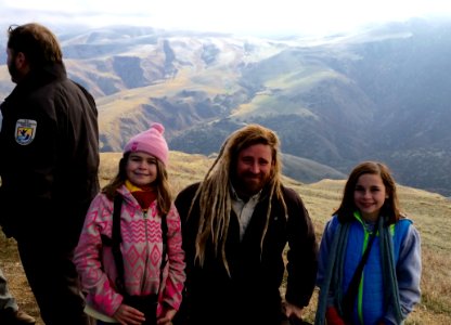 Celia (left) and Emmie (right), members of Pasadena Young Birders Club, with condor biologist Joseph Brandt. Photo by Kristy Clougherty photo