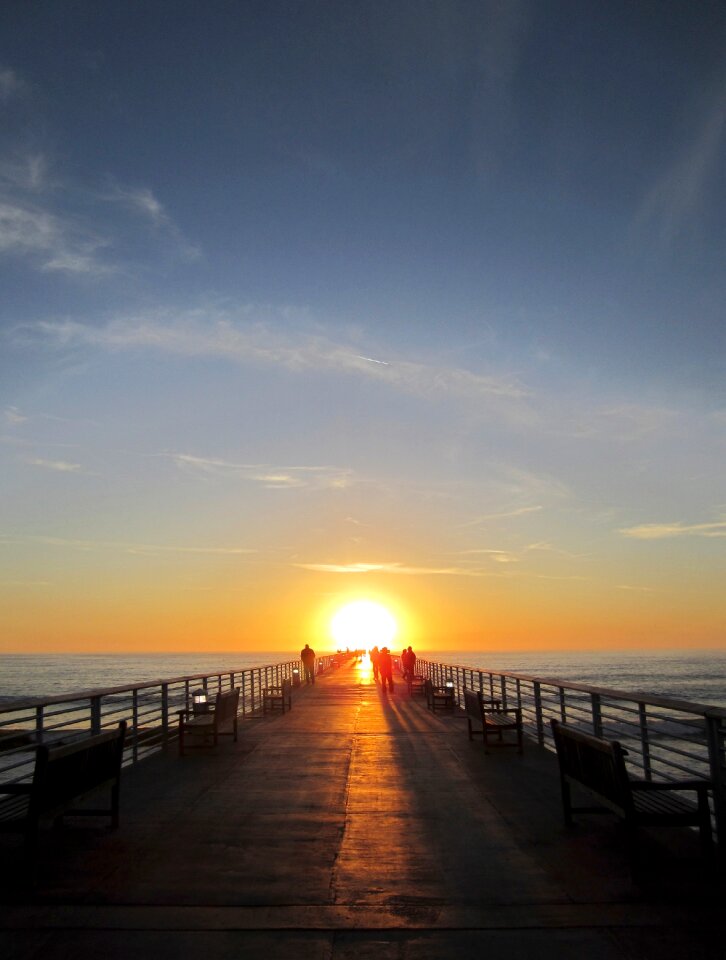 Sunset people strolling photo