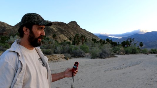 FWS Biologist Chris Gregory checks the air temperature