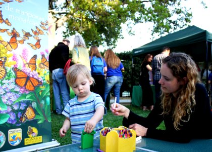 Ojai, Calif. (March 18, 2017) - Visitors color seed packets to hold native pollinator seeds during an event at the Libbey Bowl celebrating women in science, and longtime condor advocate Jan Hamber.