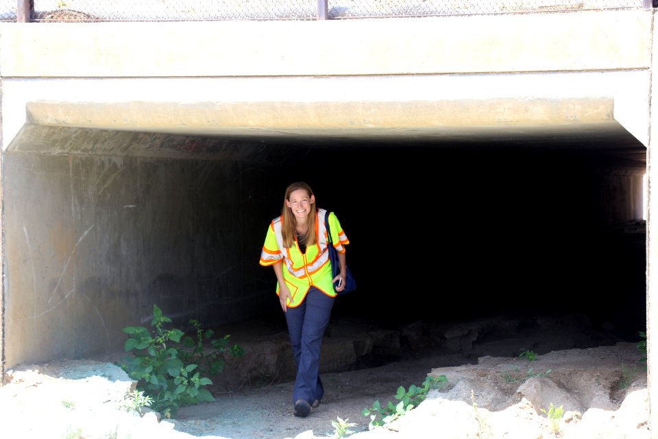 USFWS Biologist Sally Brown in undercrossing along SR-76