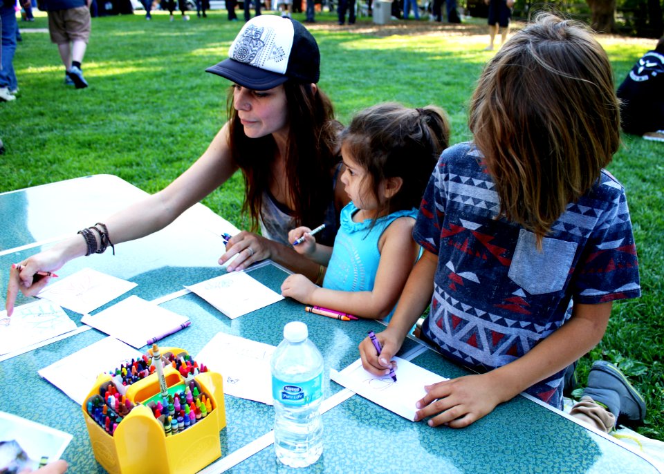 Ojai, Calif. (March 18, 2017) - Visitors color seed packets to hold native pollinator seeds during an event at the Libbey Bowl celebrating women in science, and longtime condor advocate Jan Hamber.