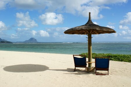 Chair parasol sandy beach photo