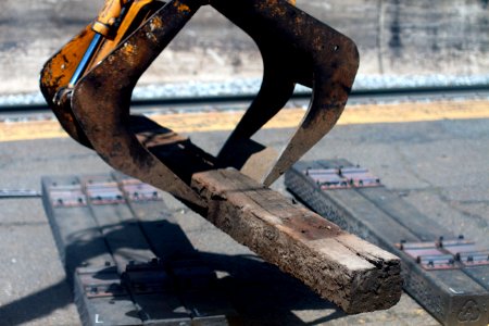 Playing the Claw Game With Railroad Ties photo