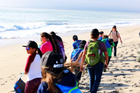 Service biologist Jenny Marek leads a beach walk. “I love the challenge of explaining complex ecological processes in way that will hopefully capture the imagination of some of these kids so they may feel a connection to the natural world," Marek said.