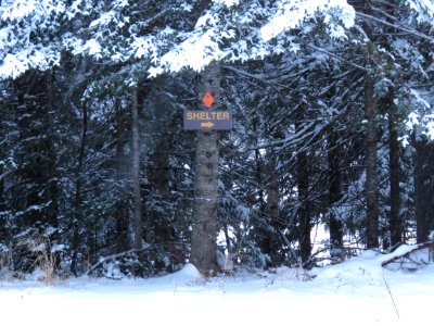 Shelter ahead on a snowmobile trail