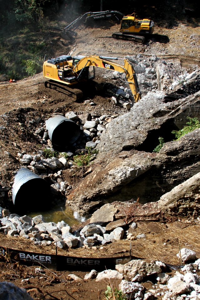 Culverts carry the Cane River through the demolition area