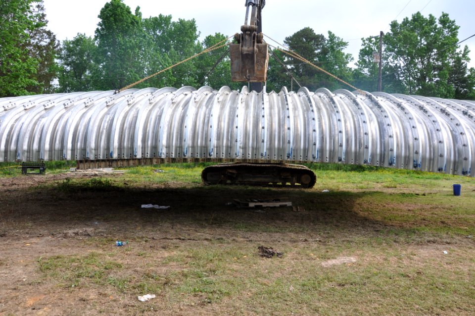 Happy Trail Culvert Project - carrying the culvert into place