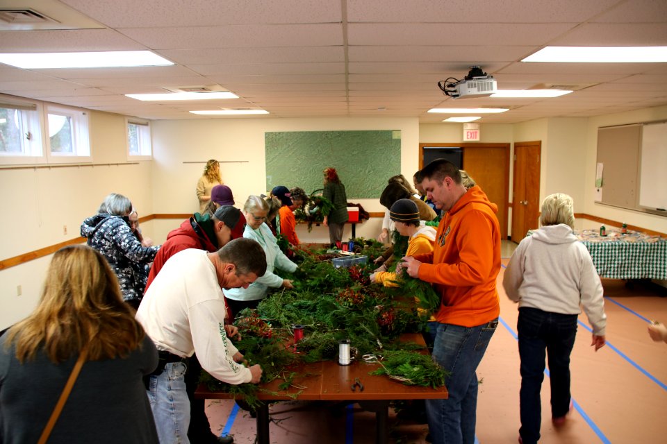 Visitors make wreaths at the 2018 Festival of Christmas Past, December 8, 2018--Warren Bielenberg