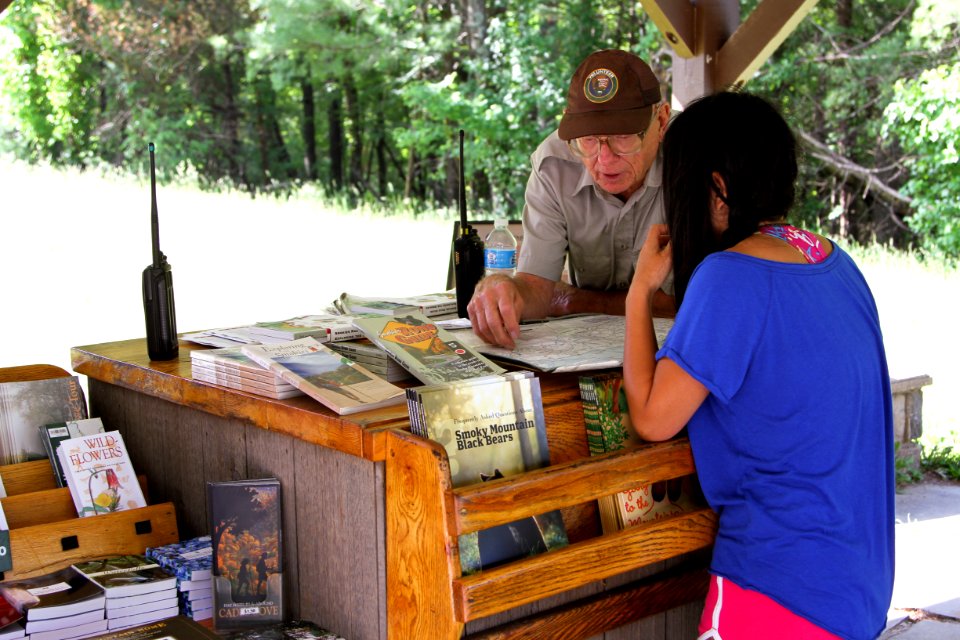VIP Ken Hardy assists visitors at Cades Cove Orientation Shelter, June 2013--Warren Bielenberg