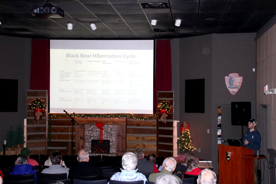 Sugarlands Visitor Center intern Zack Curtis gives a presentation on black bears at the 2018 Festival of Christmas Past, December 8, 2018--Warren Bielenberg