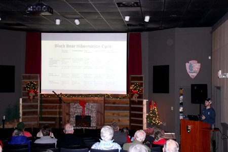 Sugarlands Visitor Center intern Zack Curtis gives a presentation on black bears at the 2018 Festival of Christmas Past, December 8, 2018--Warren Bielenberg