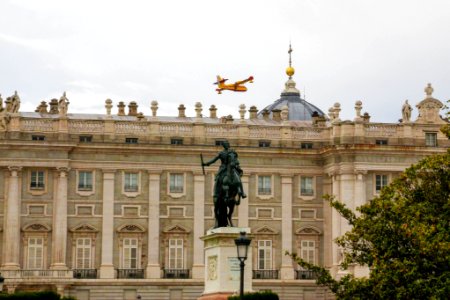 Fire airplane above the king palace - Madrid