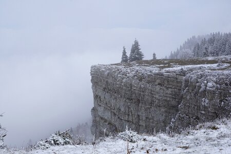 Switzerland cliff fog photo