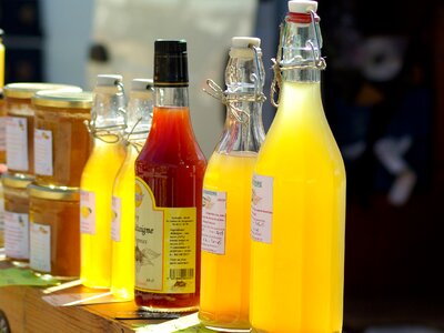 Fruit juices honey bottles photo