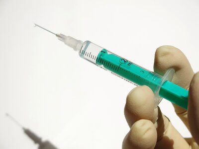 Disposable syringe needle drip photo