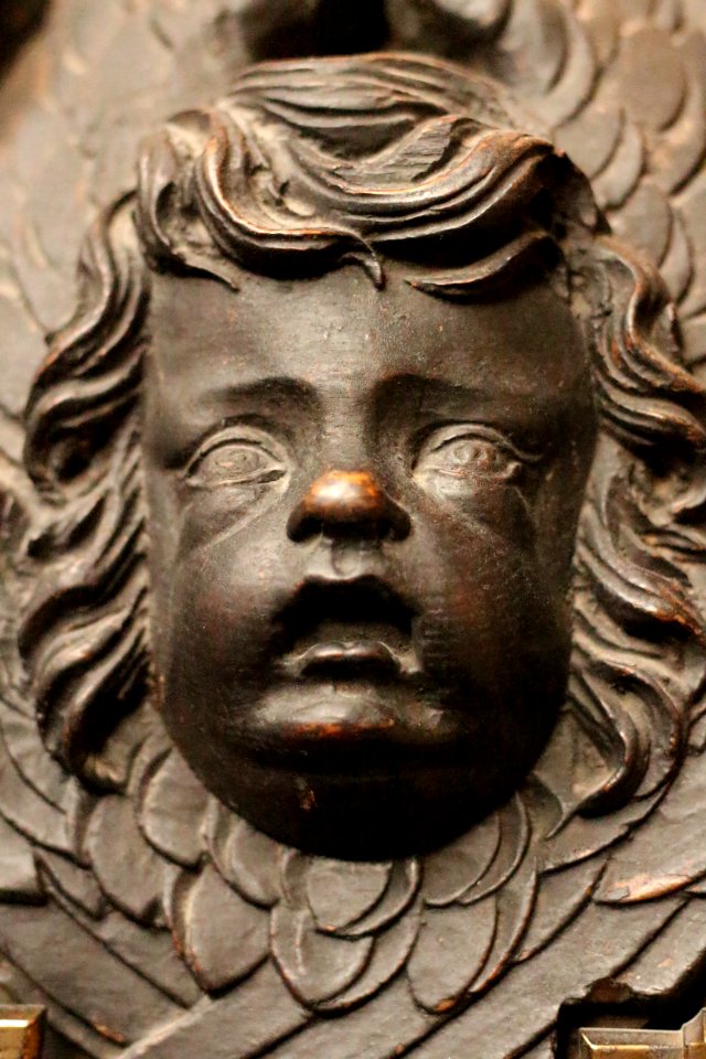 Cherub sculpture on the font of St. Sepulchre-without-Newgate