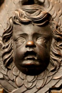 Cherub sculpture on the font of St. Sepulchre-without-Newgate photo