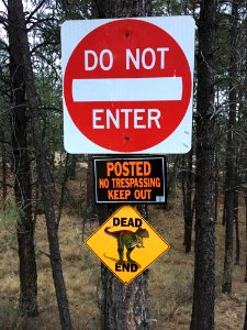 If At First You Don't Keep Out, Warn and Warn Again