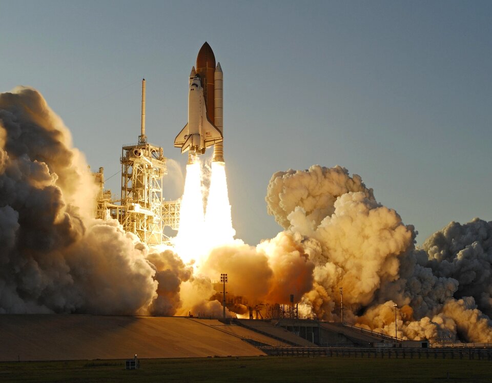 Astronauts liftoff rockets