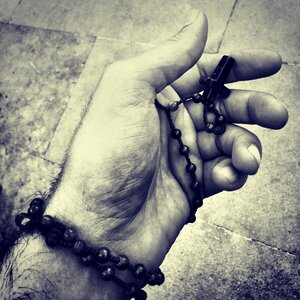 Rosary praying hand black and white